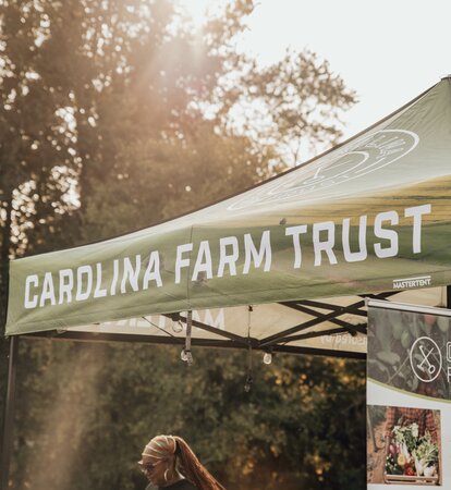 Custom printing on the Carolina Farm Trust 10x10 tent. 