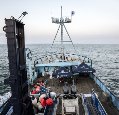 Two Mastertent canopy tents on the deck of a large Ocearch company boat going out to sea.