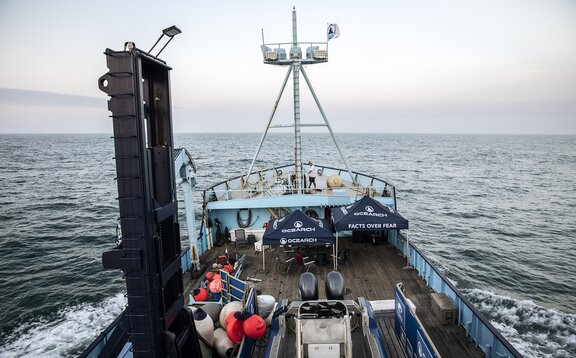 Two Mastertent canopy tents on the deck of a large Ocearch company boat going out to sea.