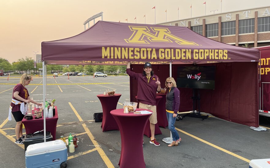 A tailgate tent by Mastertent branded for the Minnesota Golden Gophers.