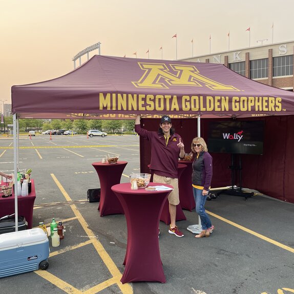 A tailgate tent by Mastertent branded for the Minnesota Golden Gophers.