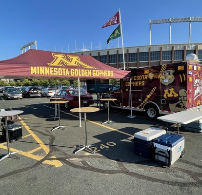 A tailgate tent by Mastertent branded for the Minnesota Golden Gophers.