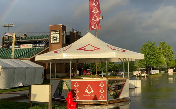 Prasco Park stadium pavilion set up in the rain. 