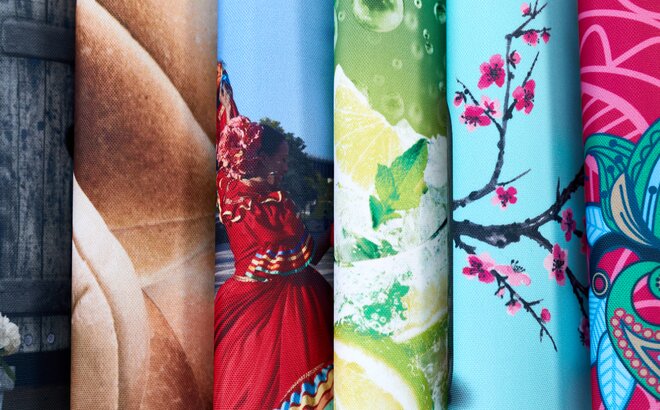 Close up of six printed pieces of fabric curved and stacked horizontally