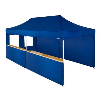 A blue 20x10ft Mastertent with five blue fabric sidewalls. Two sidewalls are closed, one is a window, and two are half-heights with wooden counters. 