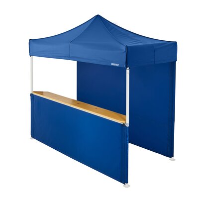 A blue 10x5ft Mastertent with two blue fabric sidewalls. One sidewall is closed and one is a half-height with a wooden counter. 