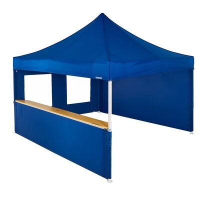 A blue 13x13ft Mastertent with three blue fabric sidewalls. One sidewall is closed, one is a window, and one is a half-height with a wooden counter. 