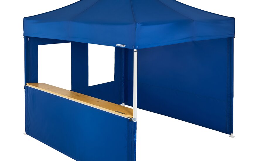 A blue 10x10ft Mastertent with three blue fabric sidewalls. One sidewall is closed, one is a window, and one is a half-height with a wooden counter. 1