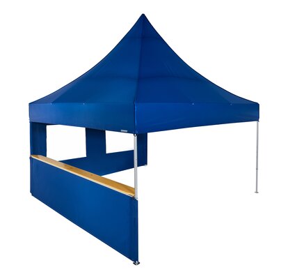 A blue 17x17ft Mastertent with two blue fabric sidewalls. One sidewall is window and one is a half-height with a wooden counter. 