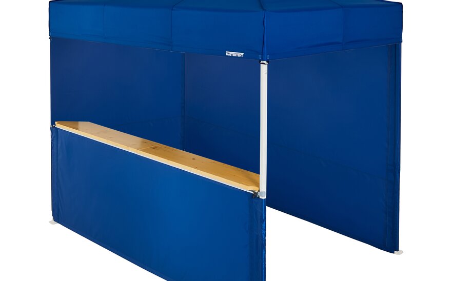 A blue 10x6.5ft Mastertent with three blue fabric sidewalls. Two sidewalls are closed and one is a half-height with a wooden counter. 