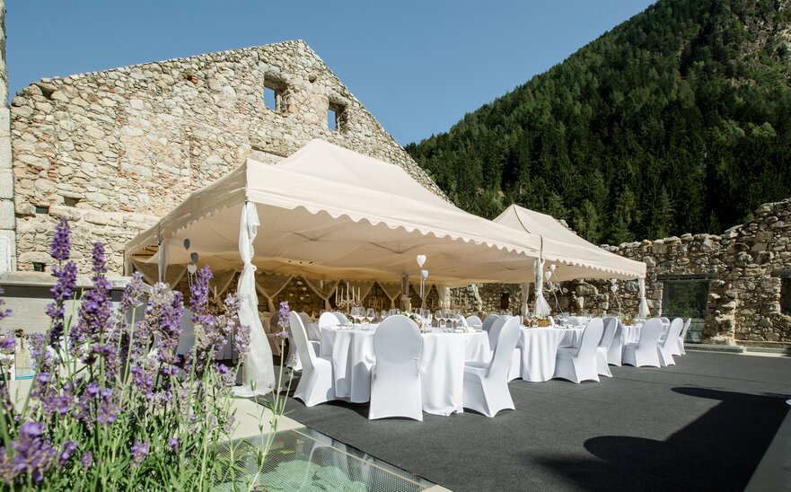 Big elegant folding tents ecru for parties and weddings with scalloped valance